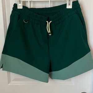 Stretch tech color block shorts green